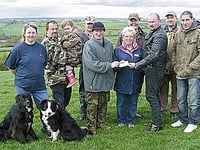 Shooting club’s £2,000  cheque for Hospiscare