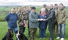 Shooting club’s £2,000  cheque for Hospiscare