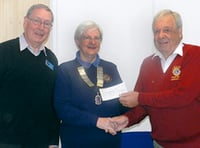 Lions presented a cheque for £750 to the talking newspaper