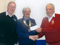Lions presented a cheque for £750 to the talking newspaper