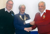 Lions presented a cheque for £750 to the talking newspaper