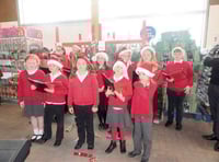 Tedburn Primary School singers entertain customers at Crediton’s Tesco store