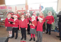 Tedburn Primary School singers entertain customers at Crediton’s Tesco store