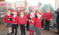 Tedburn Primary School singers entertain customers at Crediton’s Tesco store