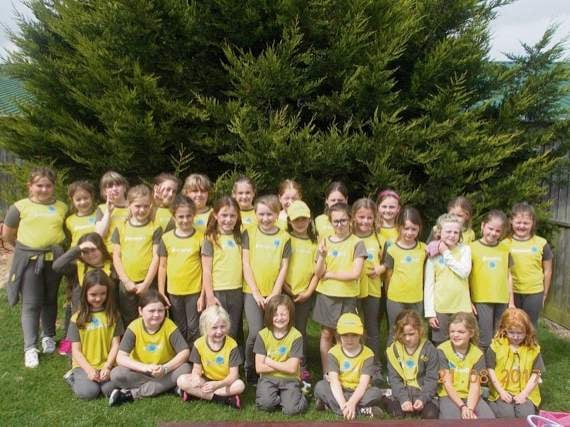 Crediton Brownies help their Brown Owl celebrate her 30 years as a leader