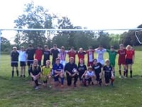 QE students raise funds for charity at football match