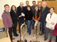 Crediton Town Band presents £318 each to Age Concern Crediton and Mid Devon Mobility