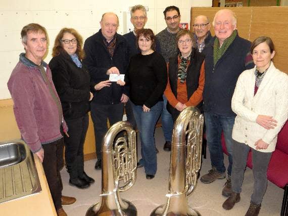 Crediton Town Band presents £318 each to Age Concern Crediton and Mid Devon Mobility