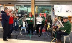 Crediton Town Band members got shoppers in the festive mood
