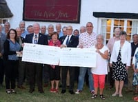 Rotary Club of Crediton Boniface presents two local charities with bumper cheques