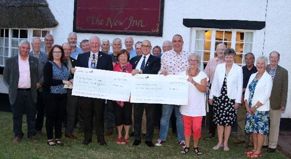 Rotary Club of Crediton Boniface presents two local charities with bumper cheques