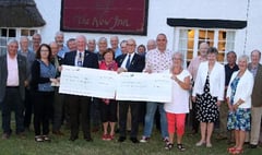 Rotary Club of Crediton Boniface presents two local charities with bumper cheques