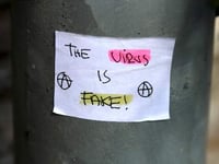 ‘The Virus is Fake’ signs appear in Crediton