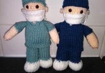 Knitted NHS dolls have raised £310 for charity