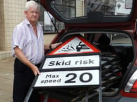 'Cross' Crediton man is collecting county council's abandoned road signs