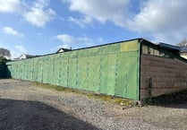 Questions over plan for five homes on site of 24 garages in Crediton