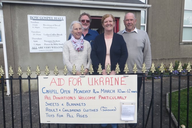 Outside Bow Gospel Hall with the sign are Ian and Jayne Finch and Ken and Wendy Harris.  SR 1324
                               