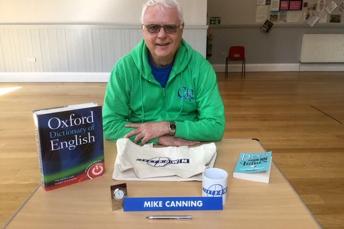 Mike Canning with the 'Countdown' goodies he received.
