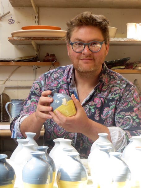 Ross Marshall holding one of his pots for Ukraine. SR 1468