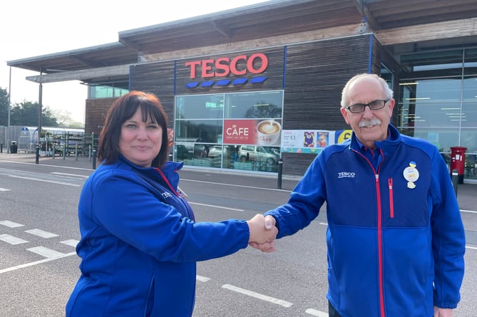 Amanda Moreton is welcomed as the new Community Champion at Crediton’s Wellparks Tesco store by John Smith, the Exeter Tesco Community Champion.  AQ 4944
