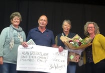 Community thanks retiring Bow postman with a £1,000 cheque
