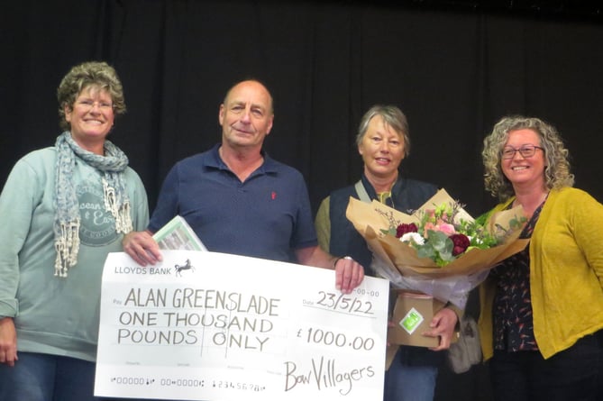 Alan receiving his bumper cheque with his wife, Annette, third left, holding the bouquet of flowers she received, flanked by Karen Gutans, left and Dawn McAllister, right.  SR 1600
