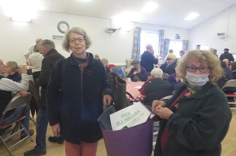  Garden Club members Pip O’Brien and Jean Alderton-Menz with the bucket of old wellies for planting.  SR 1594
