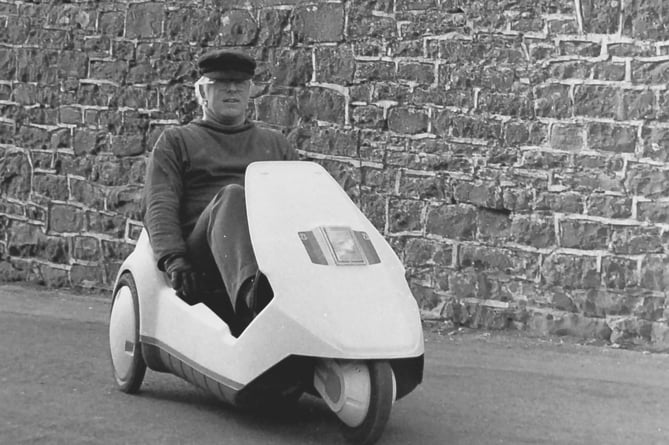 Rev Charles Edwards in his Sinclair C5 in Sandford in February 1985.
