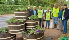 Crediton Rotarians re-fill town edge planters