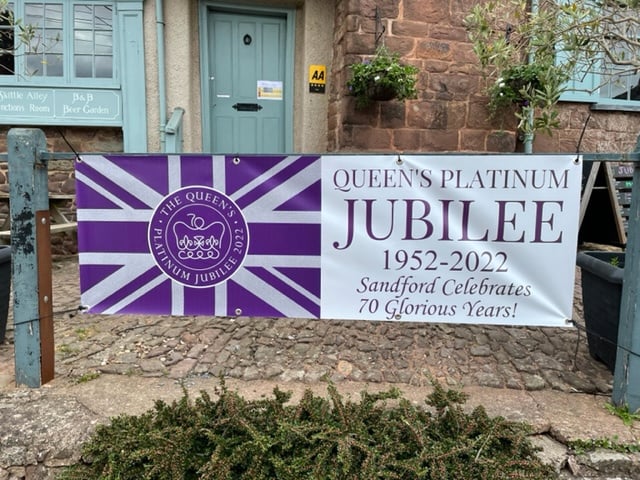 The Sandford Jubilee banner in the Square.