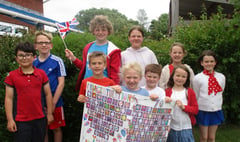 Bow School pupils sent a giant congratulatory card to the Queen
