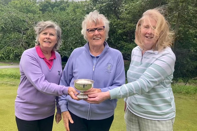 Rees Baker Cup winners, from left, Janice Thwaites, Lady Captain Judith Ezard and Cherry James.
