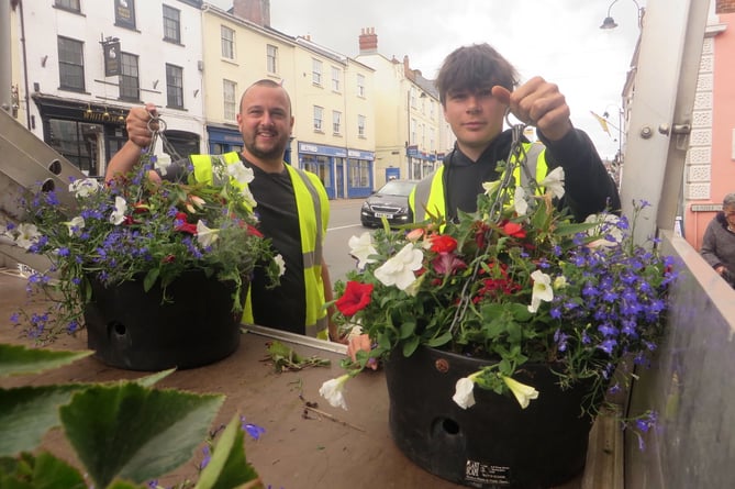 Up go the hanging baskets in Crediton High Street.  SR 2256