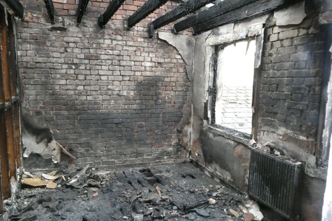 The fire is believed to have started in the upstairs flat as a result of a make-up mirror reflecting onto items inside.  