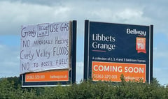Protest banner erected against plan for 257 homes near Crediton