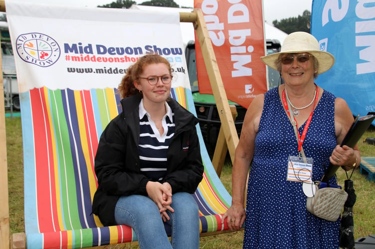 Founding Mid Devon Show secretary Marilyn Daw pictured right, with her granddaughter Bethany sat in a large deckchair at last year’s Show. AQ 2516

