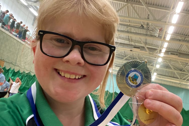 Dee Weiner with her silver medal obtained in the badminton competition.