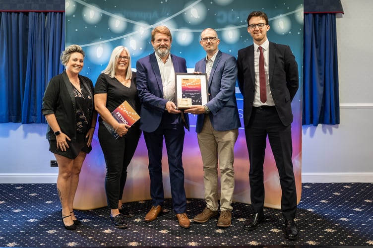 The Mid Devon District Council team collecting the Employer of the Year award, from left, Helen Duke, Haley Walker, Cllr Clive Eginton, Stephen Walford and James Hamblin.  Photo: Drew McDonald Photography