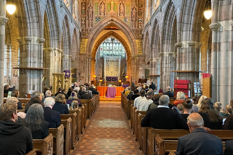 A packed church for the Crediton and Hamlets Commemorative Service held on the even of the late Queen Elizabeth’s funeral. AQ 5642