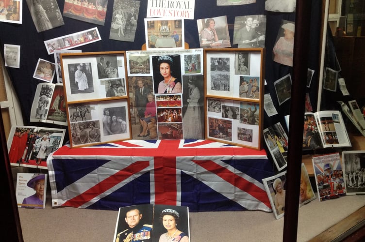 The shop window at A E Lee (Outfitters) which Simon Lee created as a tribute to her late Majesty, Queen Elizabeth II.