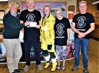 Crediton and District Swimming Club present £750 to RNLI