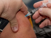 Health and care staff urged to get jabbed 