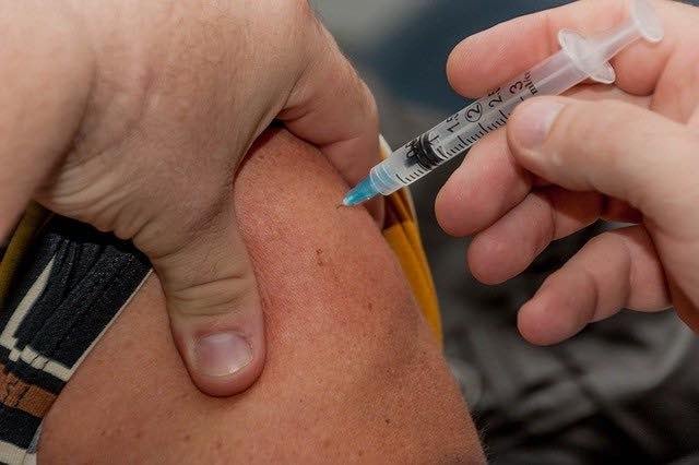 Health and care staff urged to get jabbed 