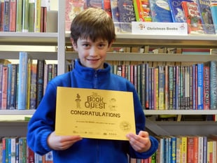 Frank receives certificate for reading 100 books