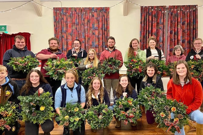 Newton St Cyres YFC members and advisory members with Catherine White after an enjoyable wreath making workshop.
