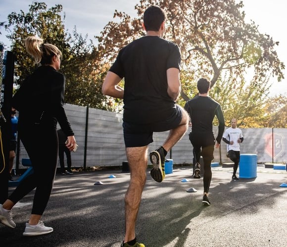 Joggers exercising.
