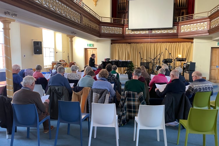 Jon Rawles with some of those who attended his choir rehearsal this week. AQ 2262