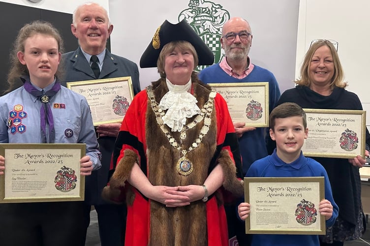 Left to Right, Izzy Foaden, Squadron Leader John Olver, Cllr Mott, Will Walker Smith, Fraser Stainer and Sadie Coventry of Merry Go Round at North Tawton.