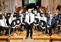 £300 for Church Fund from Fire and Rescue Band and Choir Concert
