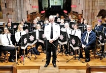 £300 for Church Fund from Fire and Rescue Band and Choir Concert
